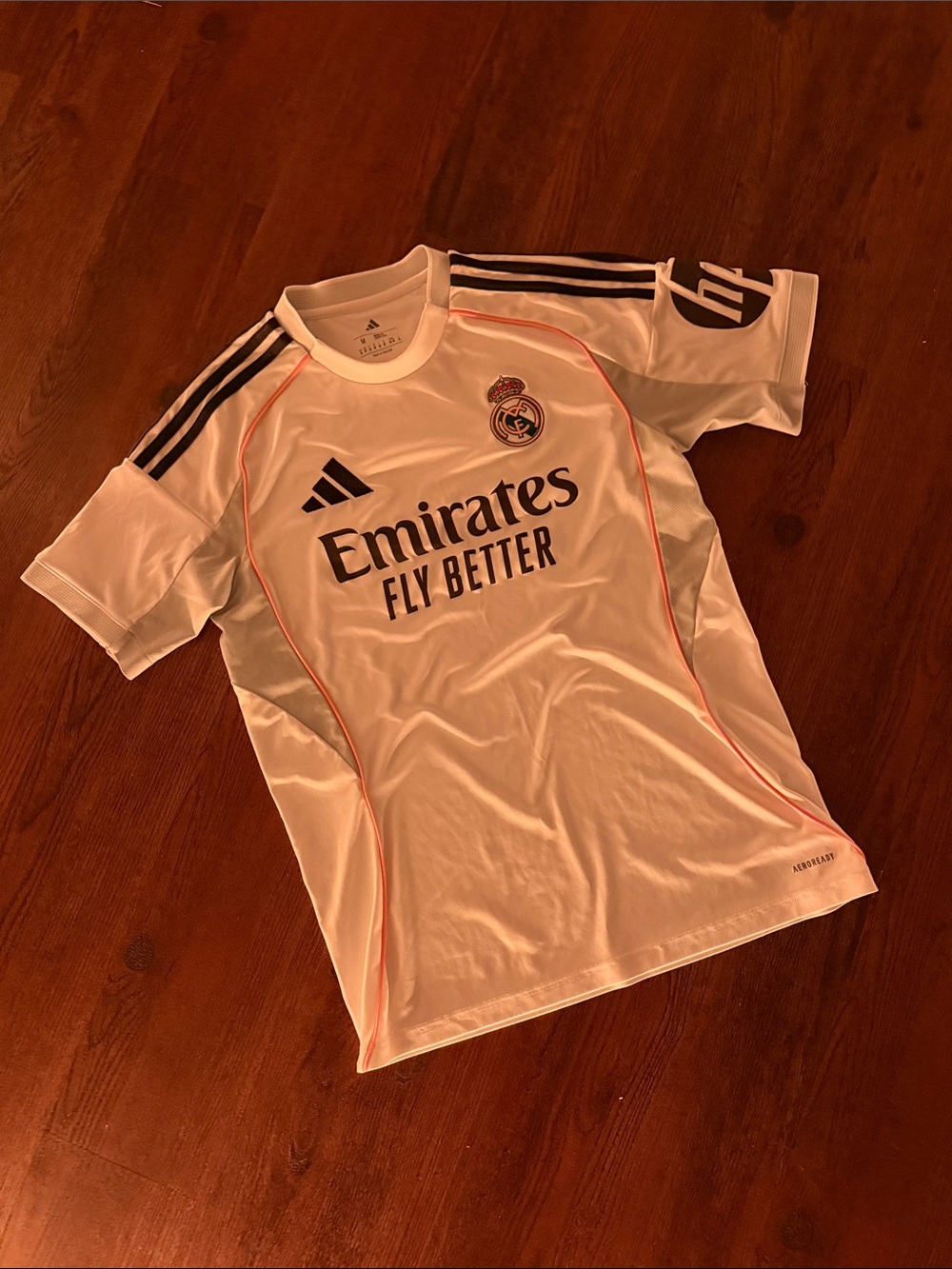 adidas White Real Madrid Kids Jersey with Navy Logos and Orange Piping